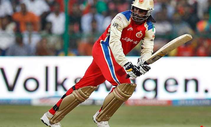 gayle helps rcb thrash csk to finish on top of league table