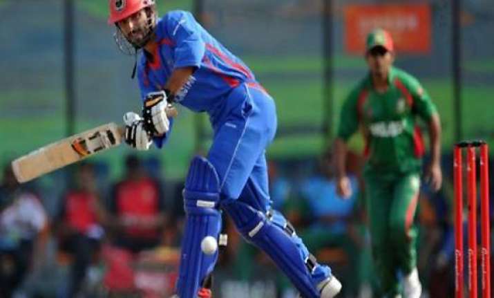 refugee to role model for afghan cricket skipper