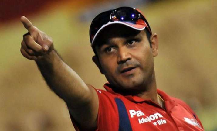 sehwag takes dig at media for calling pujara as dravid s