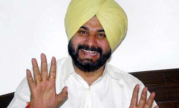 sidhu takes dig at waugh for criticising dhoni