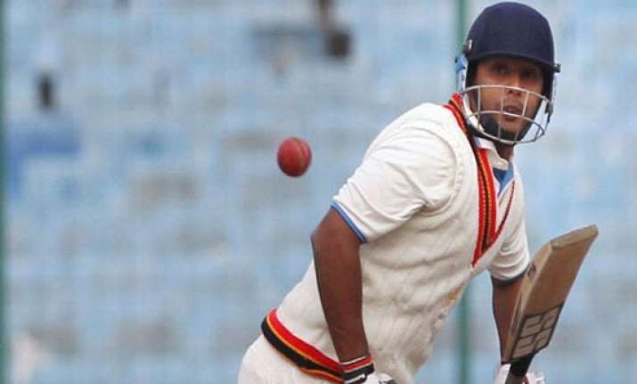 stuart binny s ton puts karnataka on top in irani cup