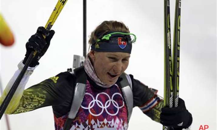 anastasiya kuzmina defends olympic title in biathlon sprint