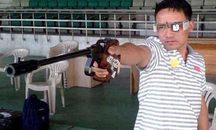 cwg rai breaks record to enter 50m men s pistol finals