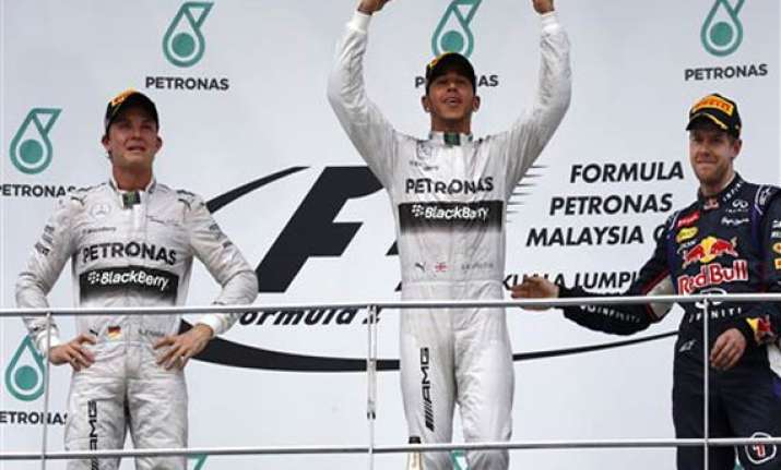 hamilton leads mercedes 1 2 at malaysian gp
