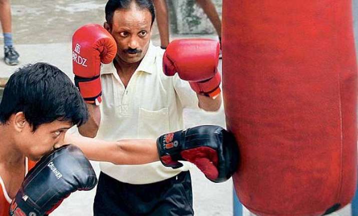 sweeper boxer seeks a job of dignity from mamata govt