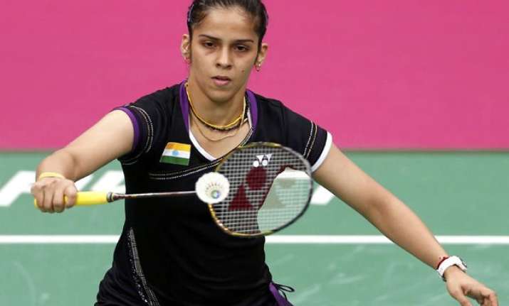 saina beats yihan wang to storm into all england semis