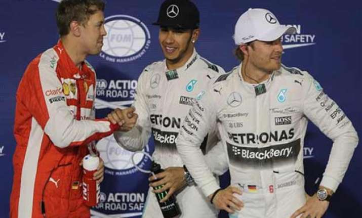 hamilton takes pole position for bahrain gp ahead of vettel