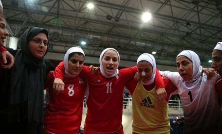 8 members of iran women s football team are actually men
