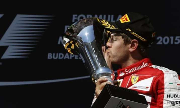 sebastian vettel wins action packed hungarian grand prix
