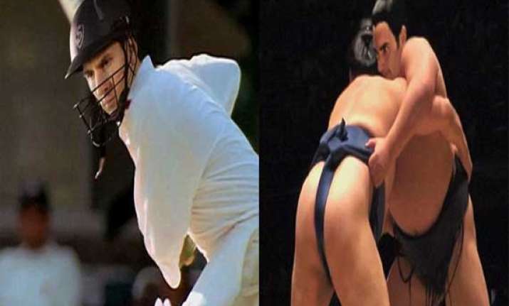 messi in india playing cricket federer in japan doing sumo