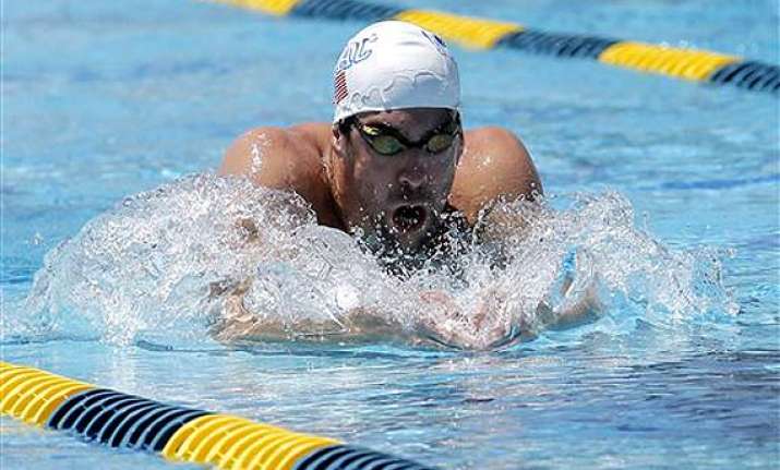 michael phelps having fun in his return to swimming