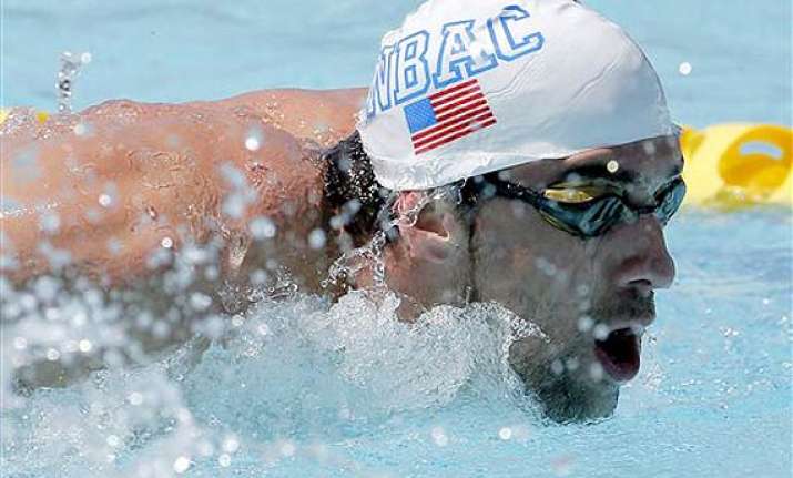 michael phelps loses to lochte in comeback meet