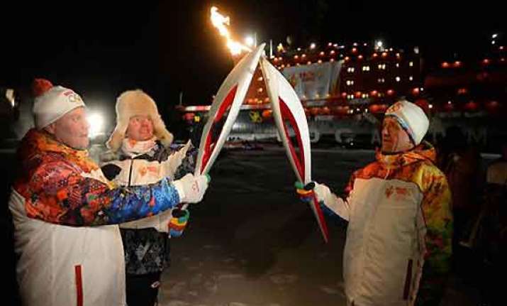 olympic torch reaches north pole