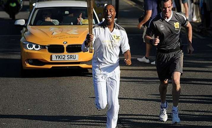olympic torch becomes cultural happening in uk