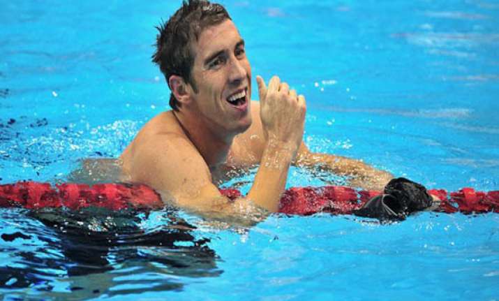 phelps back in action but mum on comeback