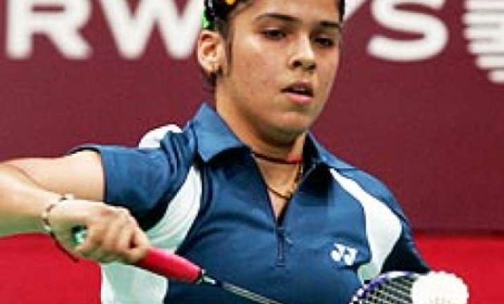 saina reaches second round in indonesia open