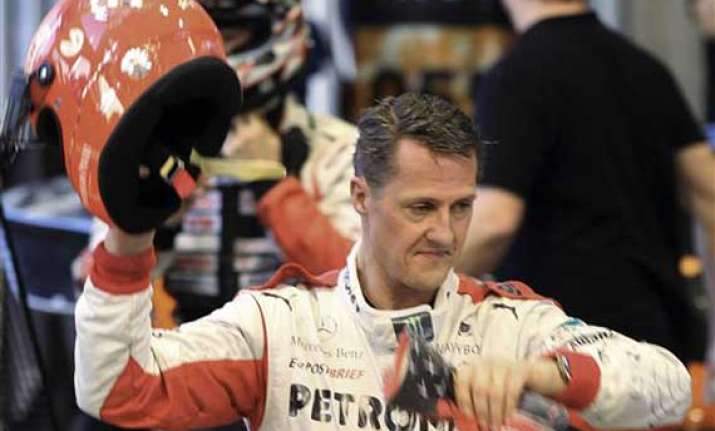 schumacher leaves french hospital out of coma