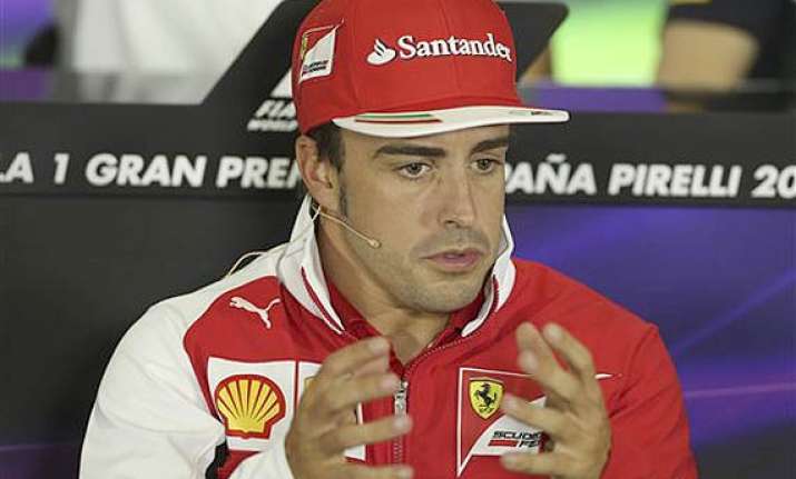 spanish gp fernando alonso warns spanish fans podium is