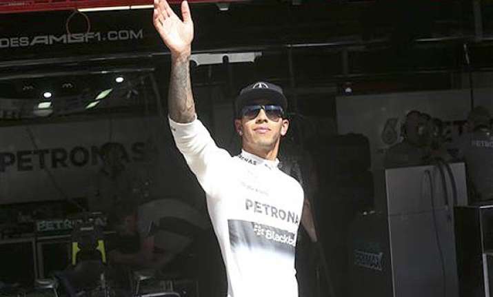 spanish gp vettel sputters out of practice lewis hamilton