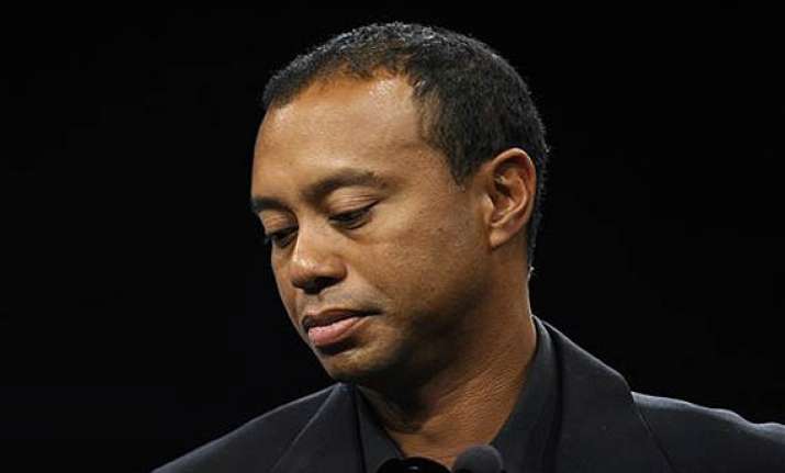 tiger woods says he s healing slowly from back surgery