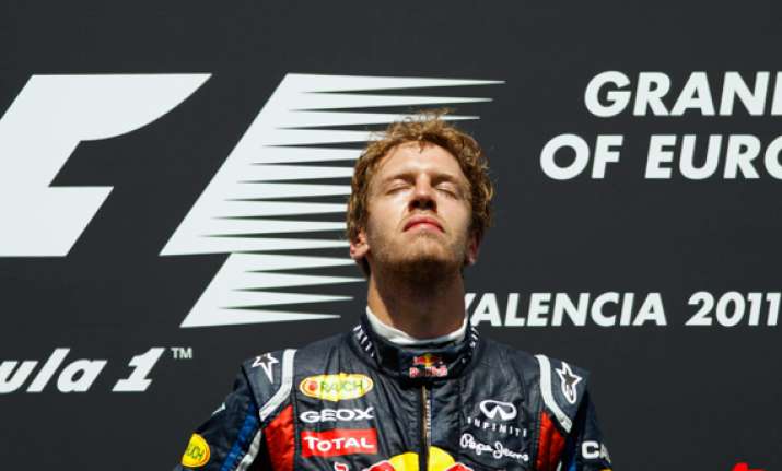 with little drama vettel easily wins f1 title