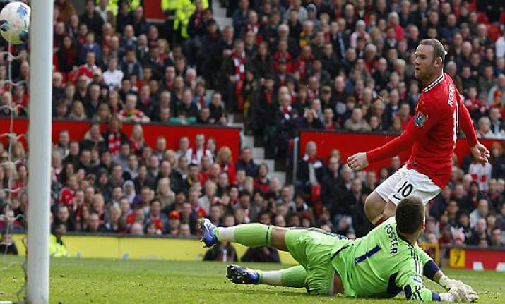 advantage fergie as rooney double lifts united over city to