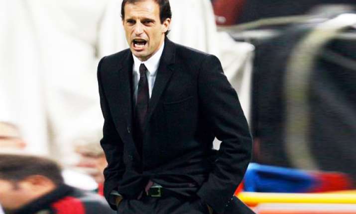 allegri says milan is fighting for title at roma