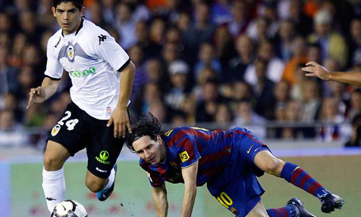 ankle injury ends banega s season for valencia
