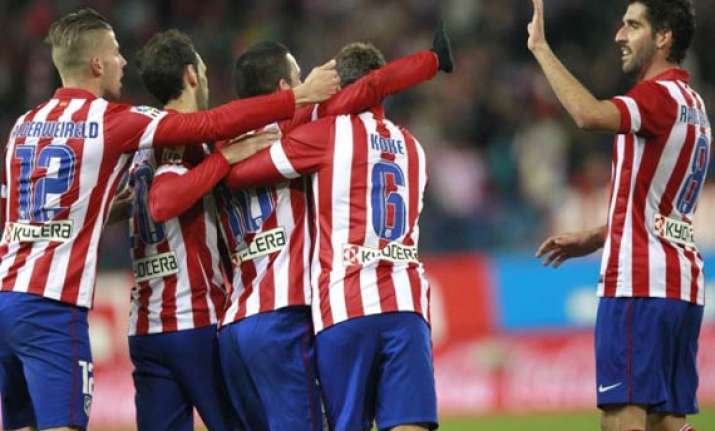 atletico madrid go top of la liga after win over sociedad
