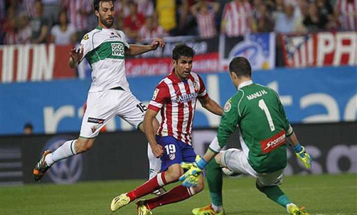 atletico madrid extends liga lead before chelsea cl match