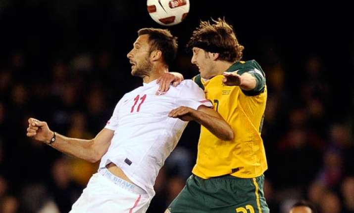 australia advances in olympic qualifier