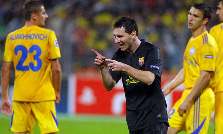 messi s double helps barca rout bate 5 0