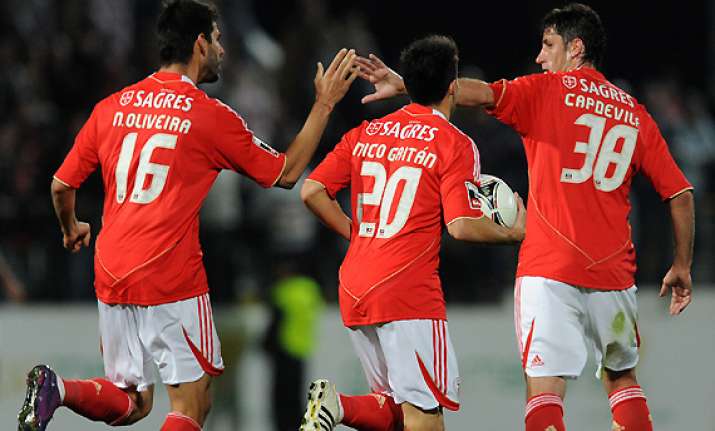 benfica beats pacos ferreira 2 1 in portugal