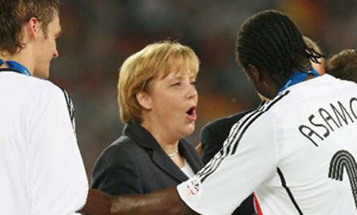 chancellor angela merkel to visit german team