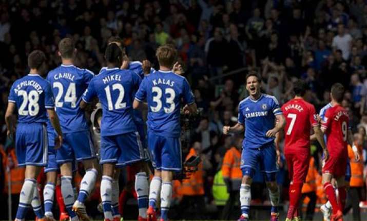 chelsea dents liverpool hopes with anfield win