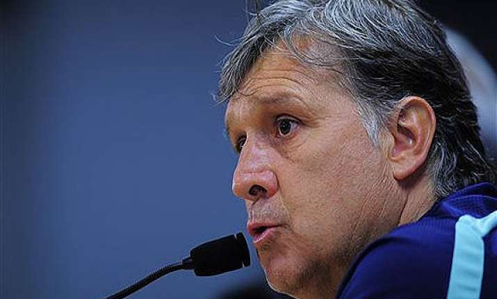 coach gerardo martino leaves barcelona after losing league