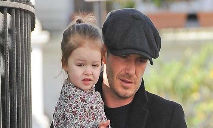 david beckham loves styling daughter