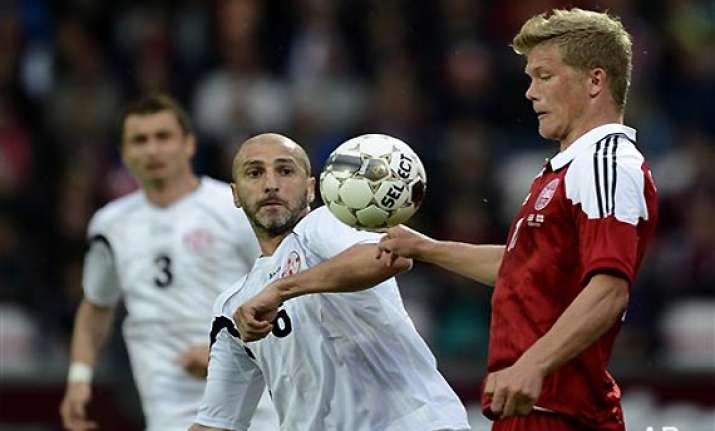 denmark beat georgia 2 1 with last minute goal