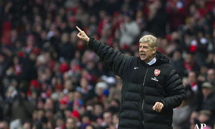 despite title drought arsenal commits to prudence