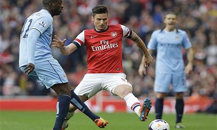 epl arsenal prevents man city going top with 1 1 draw.