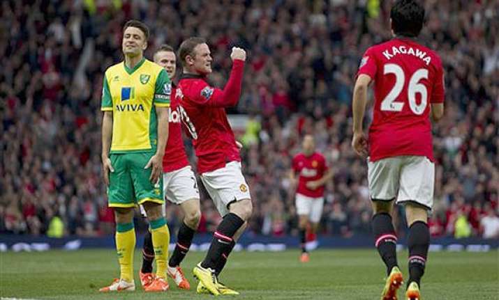 epl man united beats norwich 4 0 as giggs takes charge