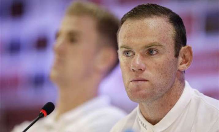 fifa world cup wayne rooney apologizes to fans after