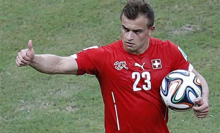 fifa world cup shaqiri s hat trick puts swiss into 2nd round