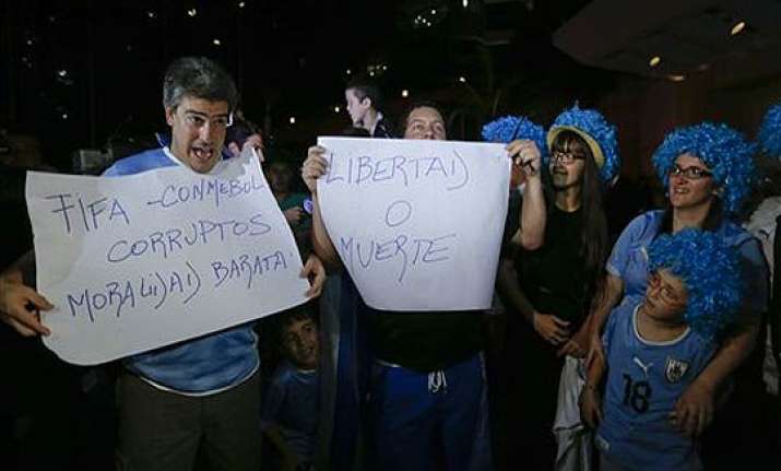 fifa world cup uruguayan soccer fans wait for banned suarez
