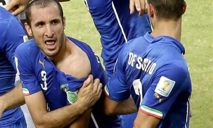 fifa world cup chiellini says suarez ban for biting him