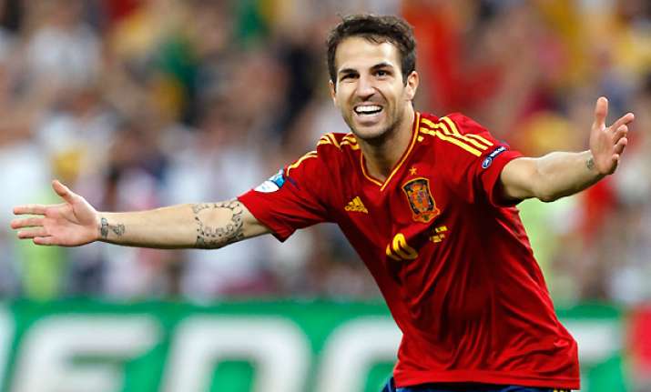 fabregas delivers again with penalty for spain