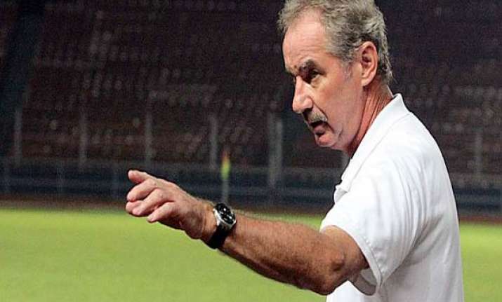 fired coach threatens action against. indonesian fa