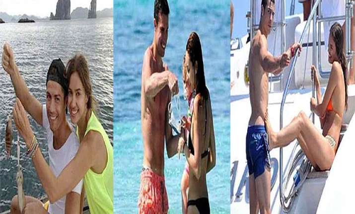 football stars romancing out in the beach before the start