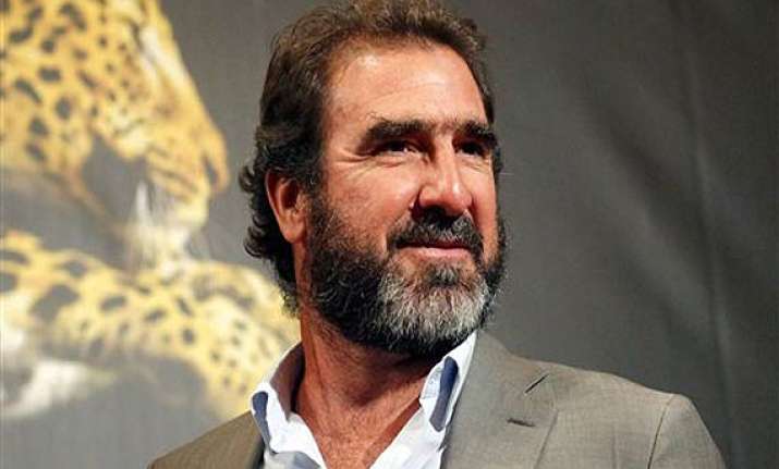former manchester united player eric cantona arrested for