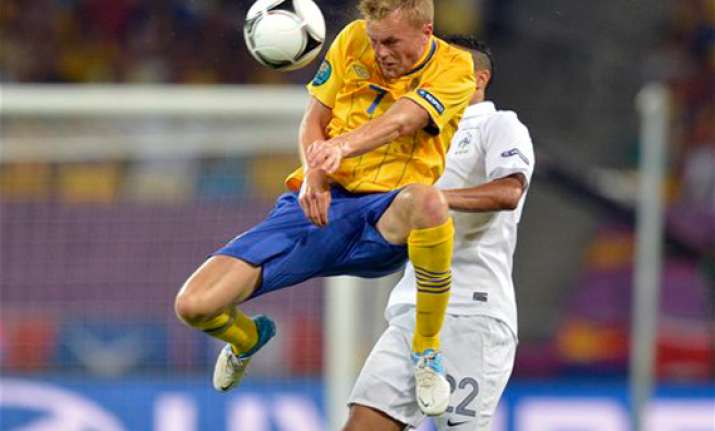 france reaches euro 2012 quarters despite 2 0 loss